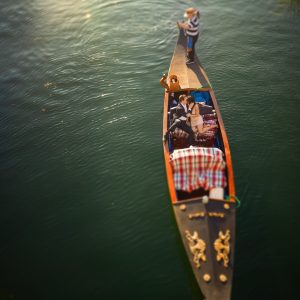 a person riding a skate board on a body of water