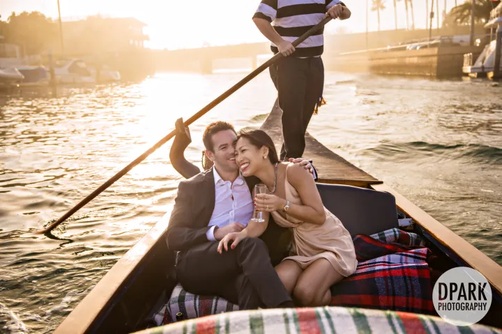 a person sitting in a boat on a body of water