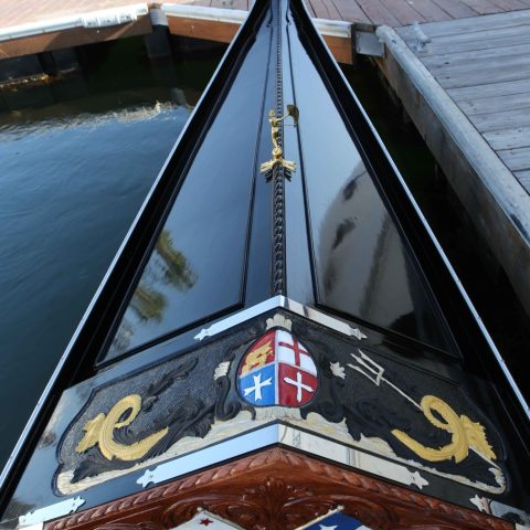 a boat sitting on top of a wooden table